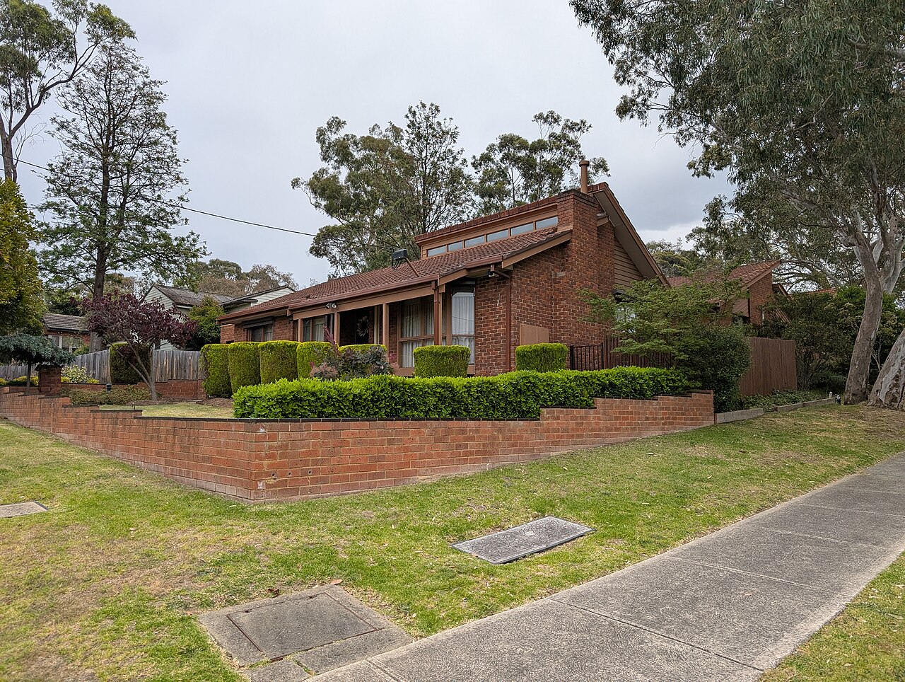 1970s pitched-roof brick house in Macleod