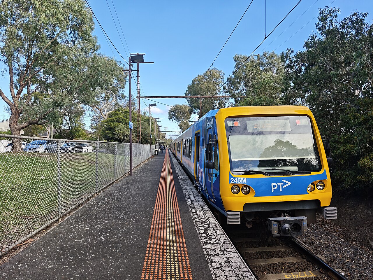 Suburban train waiting at the platform at Alamein