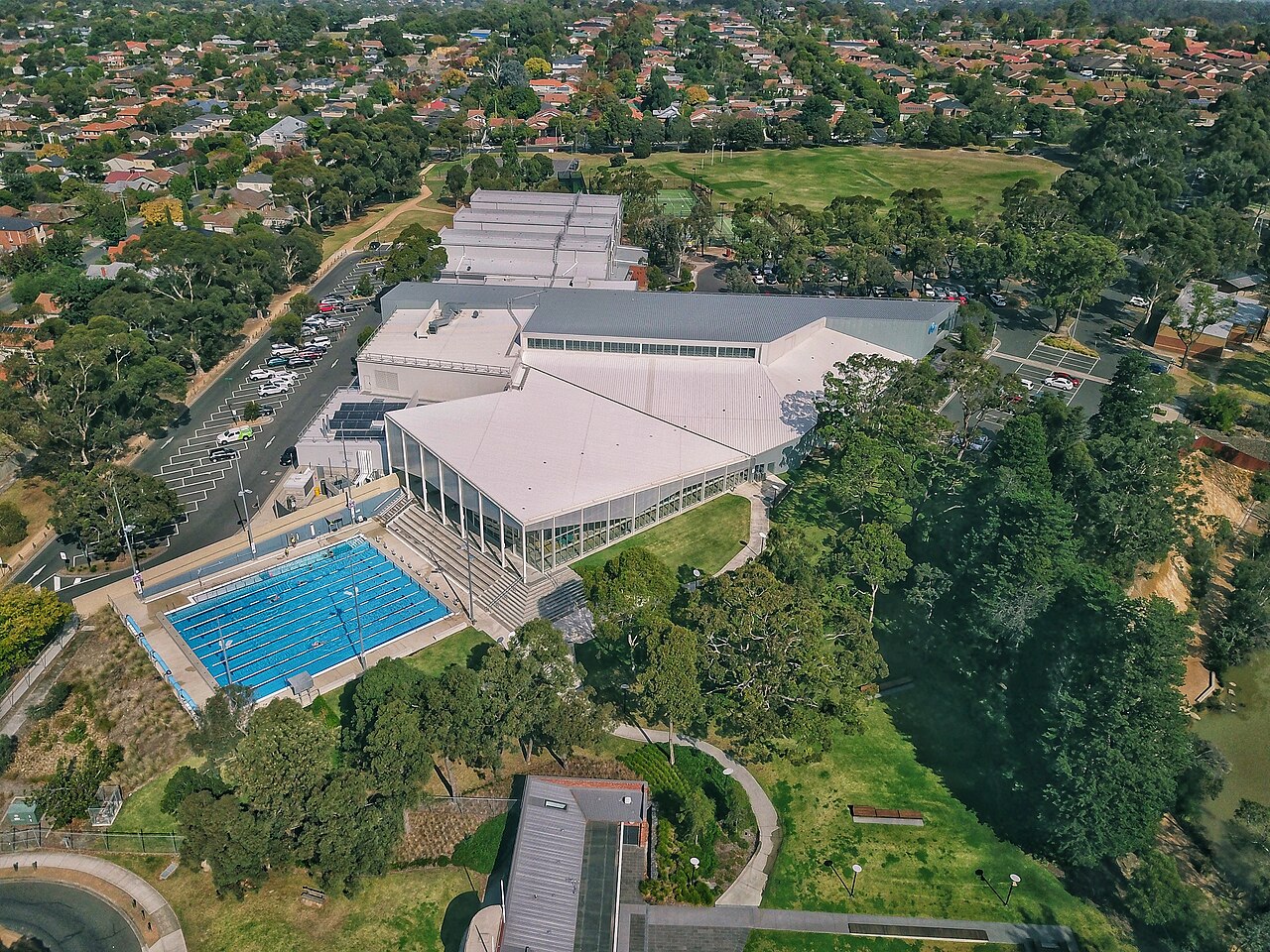 Aerial view of the Aqualink Box Hill aquatic centre and outdoor pool