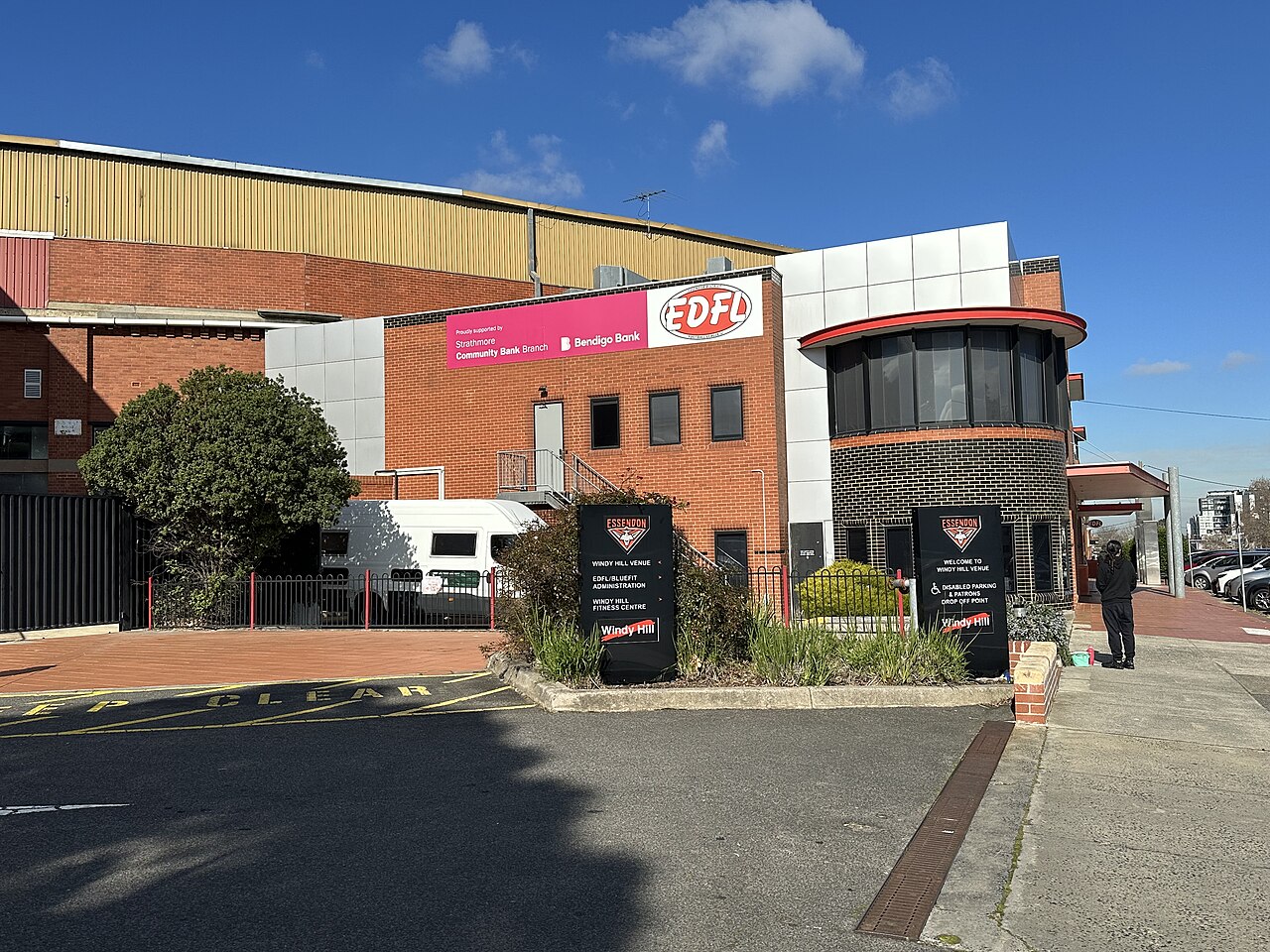 Back of the Windy Hill grounds with brick club buildings