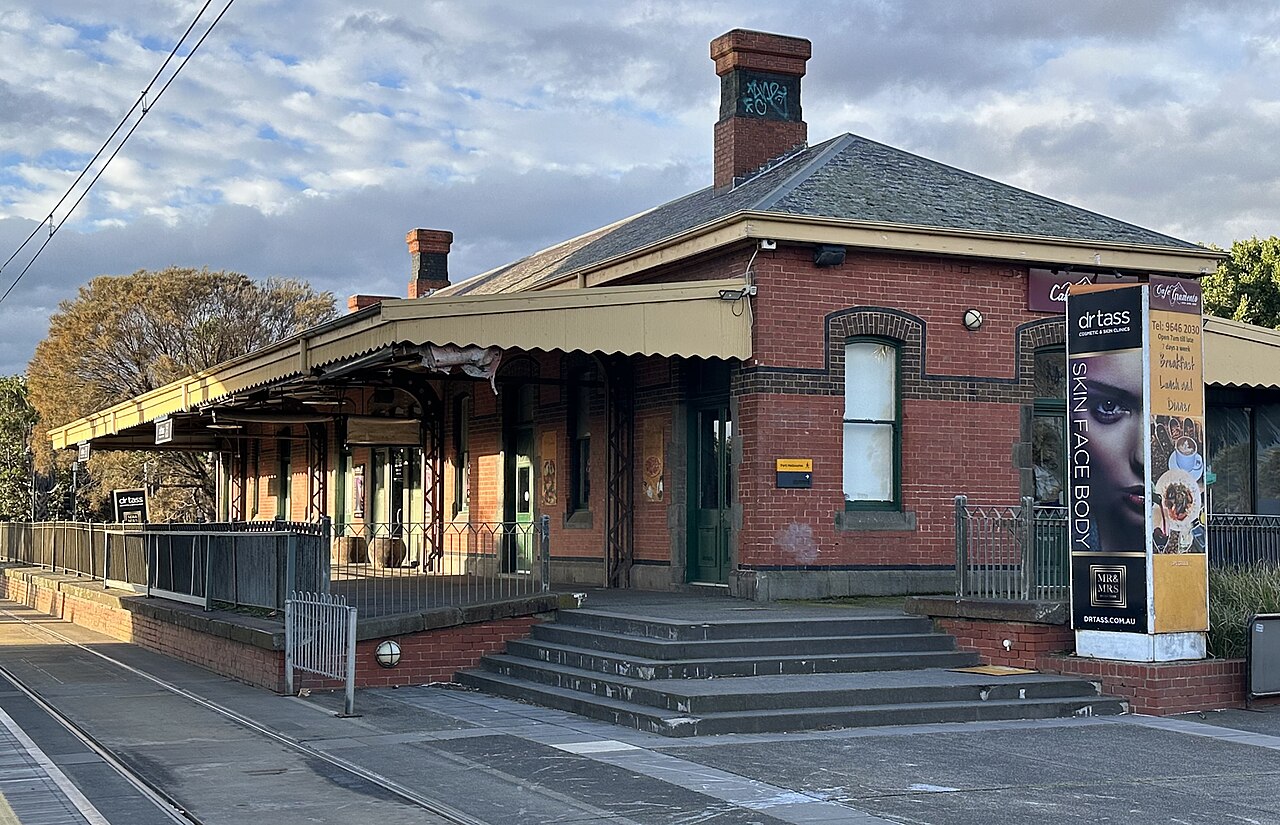Old red-brick station building at Beacon Cove light rail station