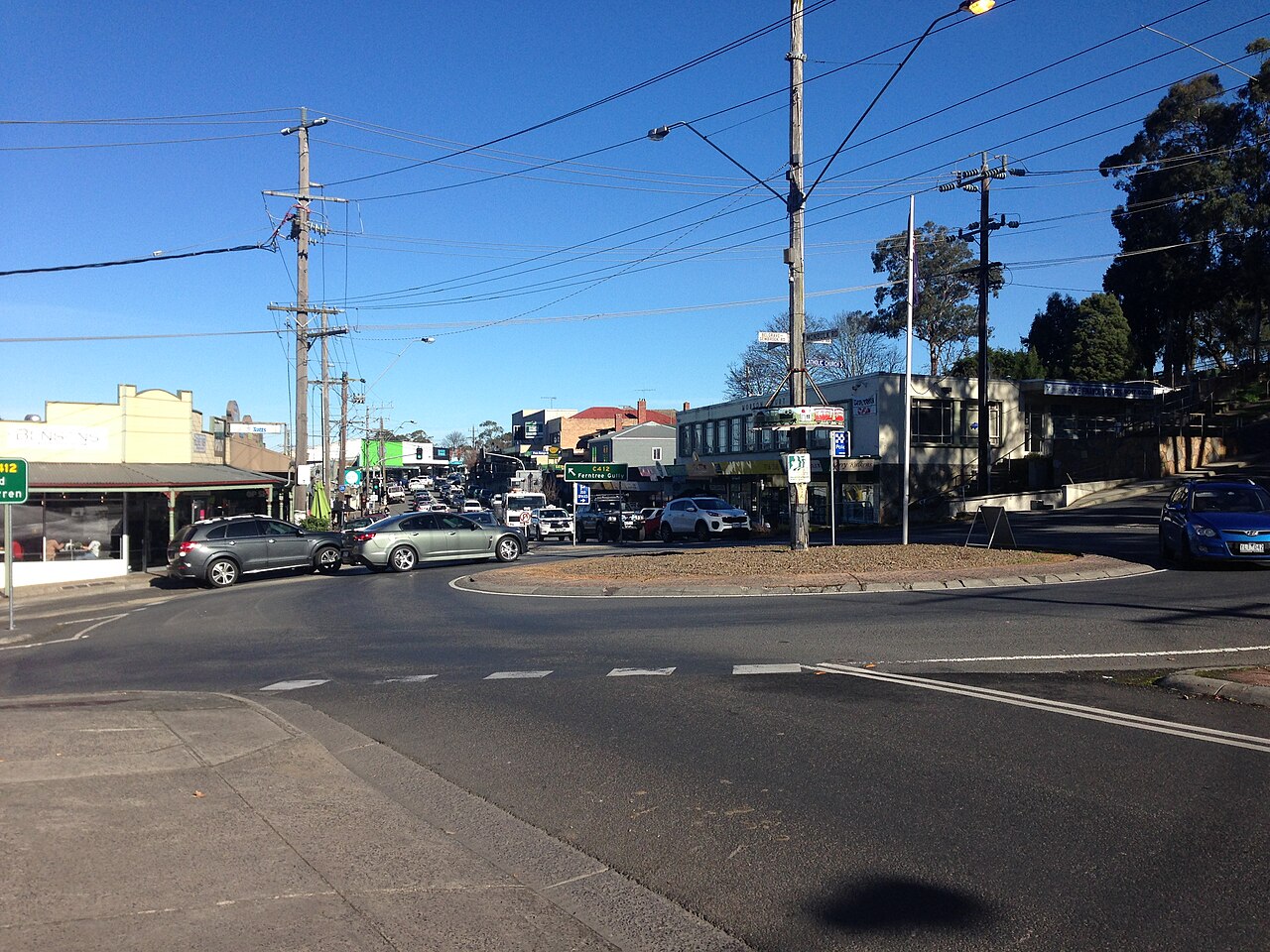Belgrave roundabout on Burwood Highway with shops