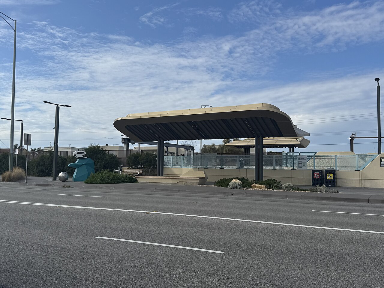 Shelter at Bonbeach railway station under a blue sky