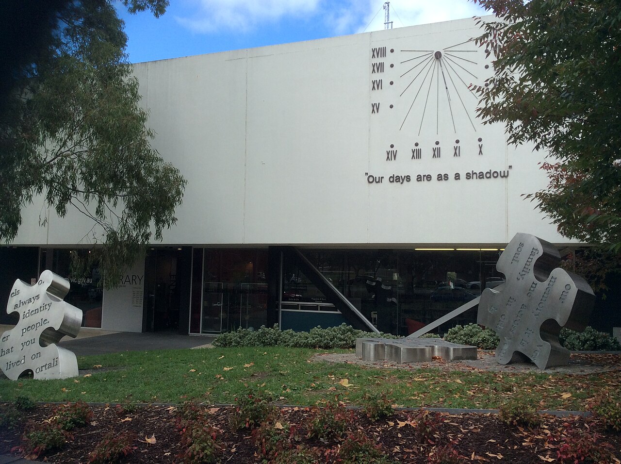 Sundial on the wall of Box Hill Library