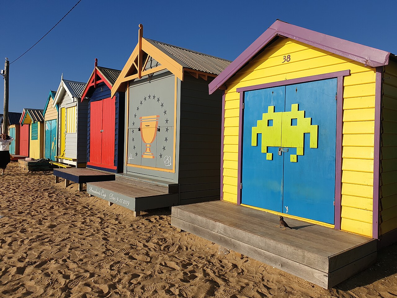 Painted bathing boxes on Brighton beach