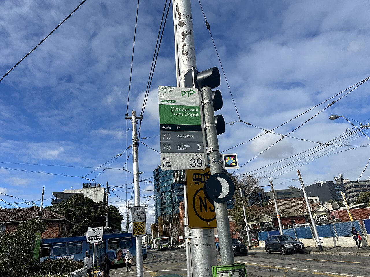 Camberwell tram depot tram stop with overhead wires on a sunny day