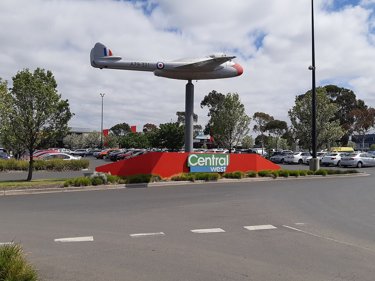 CentralWest shopping centre sign with an aircraft sculpture