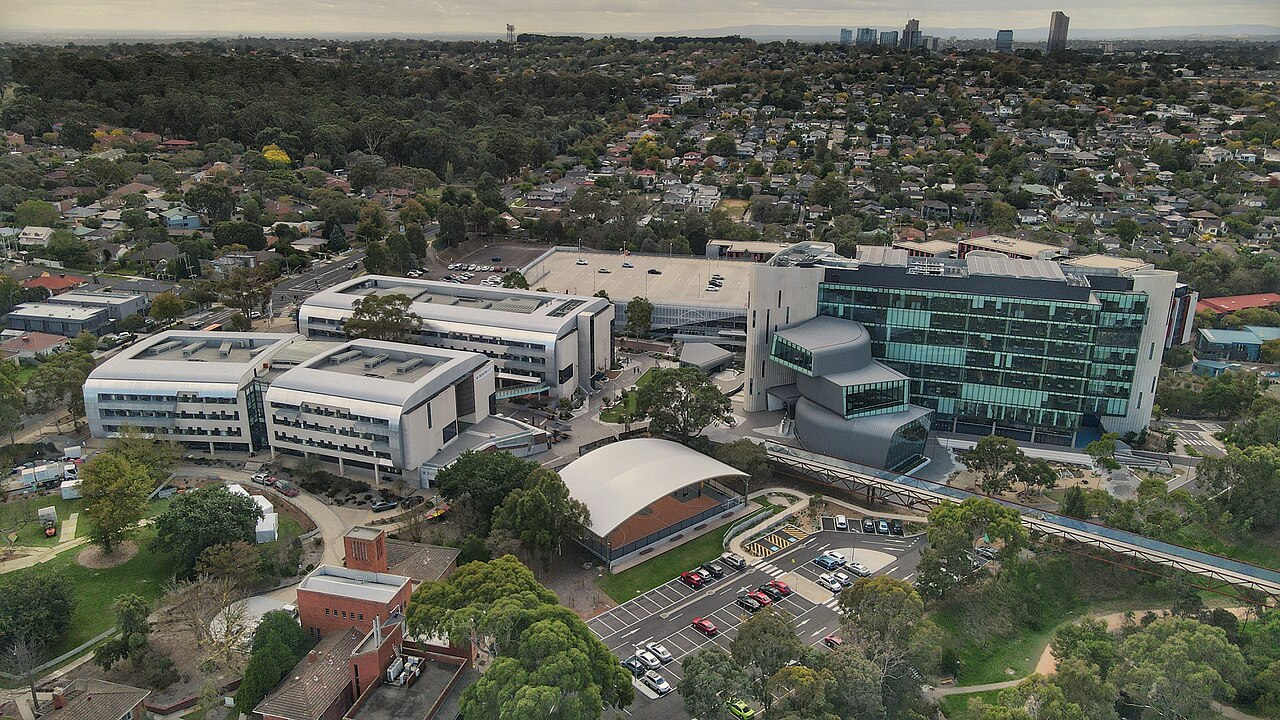Aerial view of Deakin campus with Box Hill on the horizon