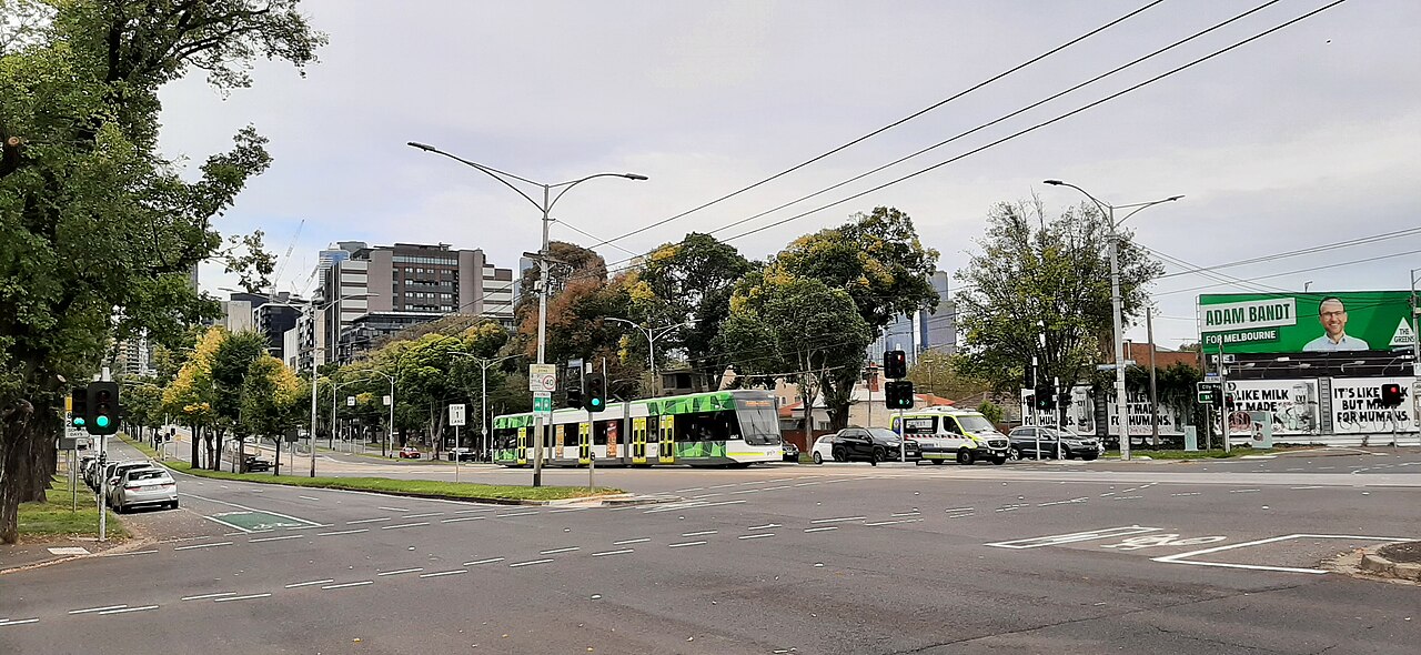 Flemington Road with a tram in the distance