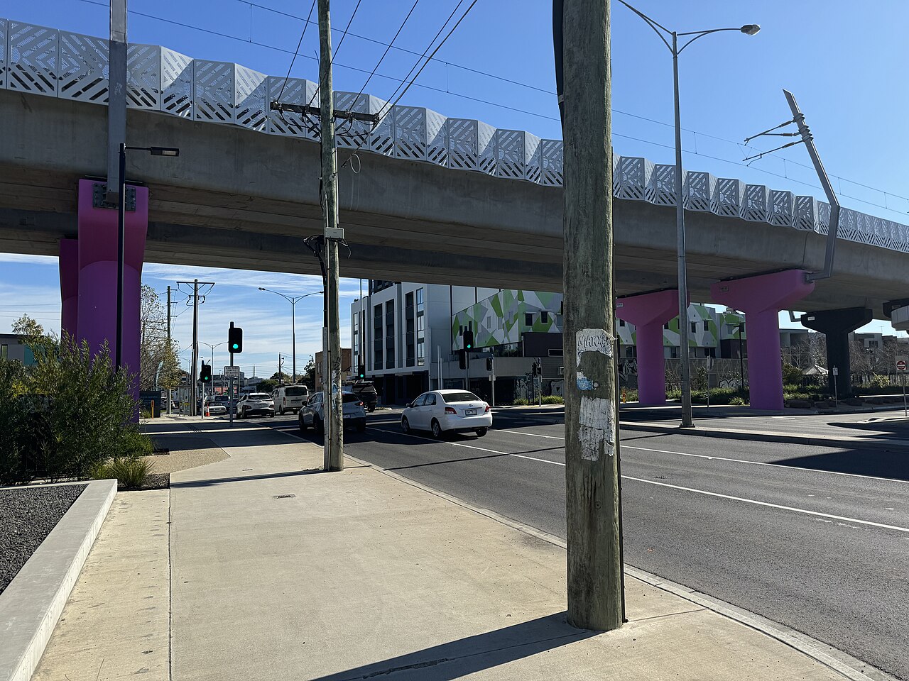 Former site of the Bell Street level crossing beneath the elevated railway