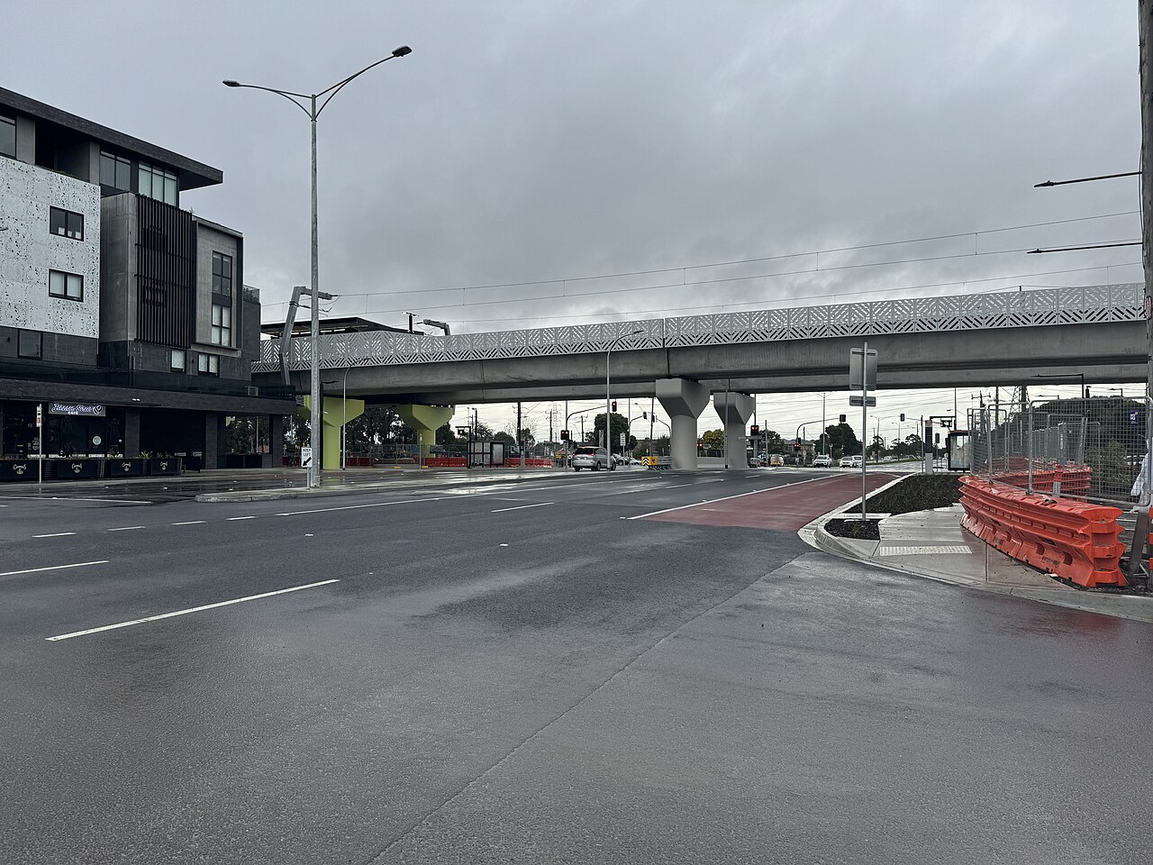 Former level crossing site at Keon Parade beneath the new rail bridge