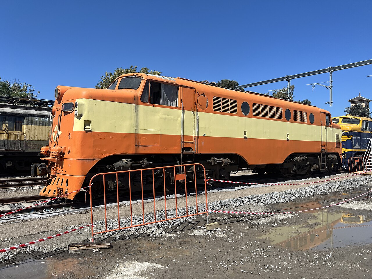 Orange diesel locomotive L1169 at Newport Workshops