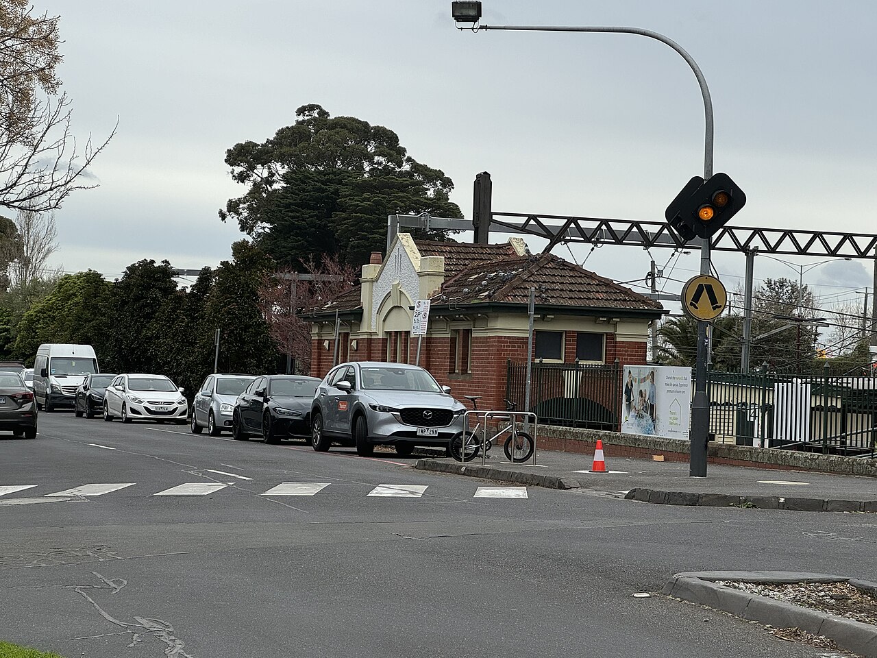 Street crossing and houses near Malvern railway station