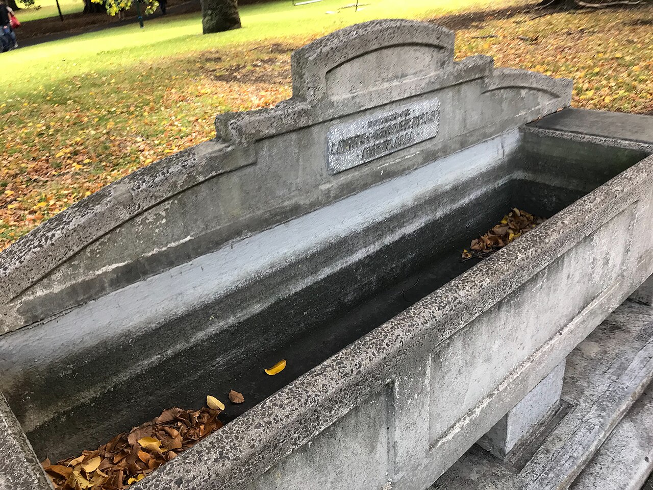 Historic stone Bills horse trough in Treasury Gardens