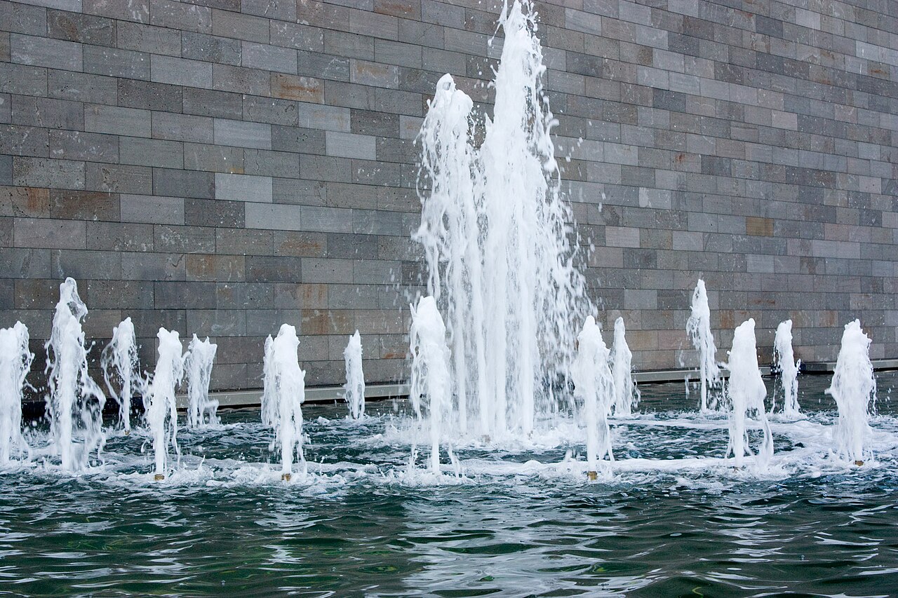 Fountain in front of the bluestone wall of the National Gallery of Victoria