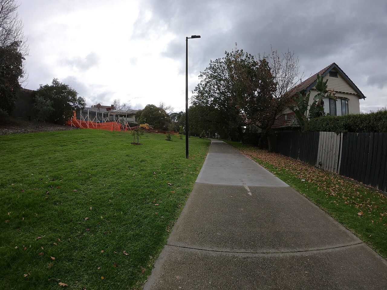 Outer Circle Trail path beside open grass near Maitland Avenue
