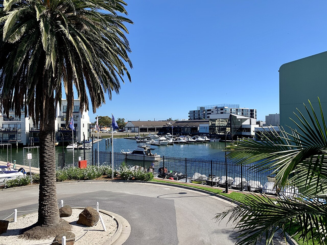Patterson Lakes Marina with moored boats and palm trees