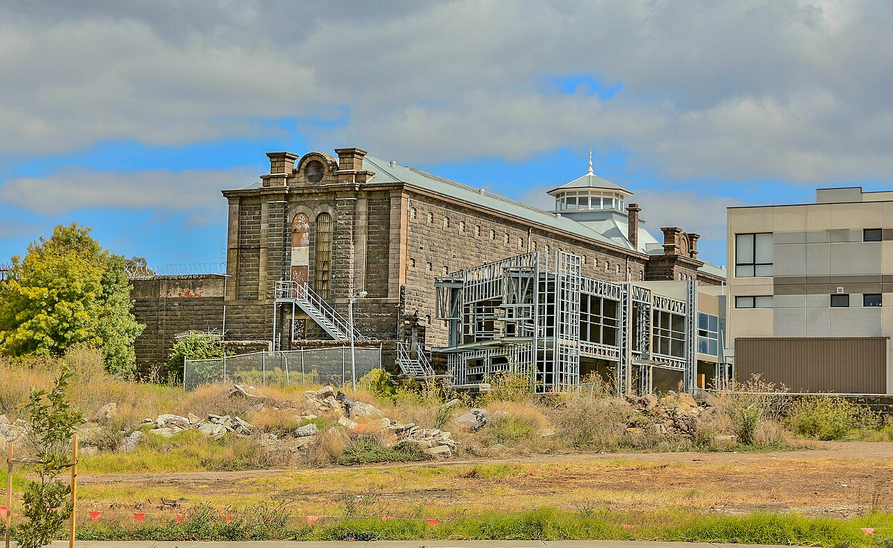 Historic bluestone building seen from Pentridge Boulevard