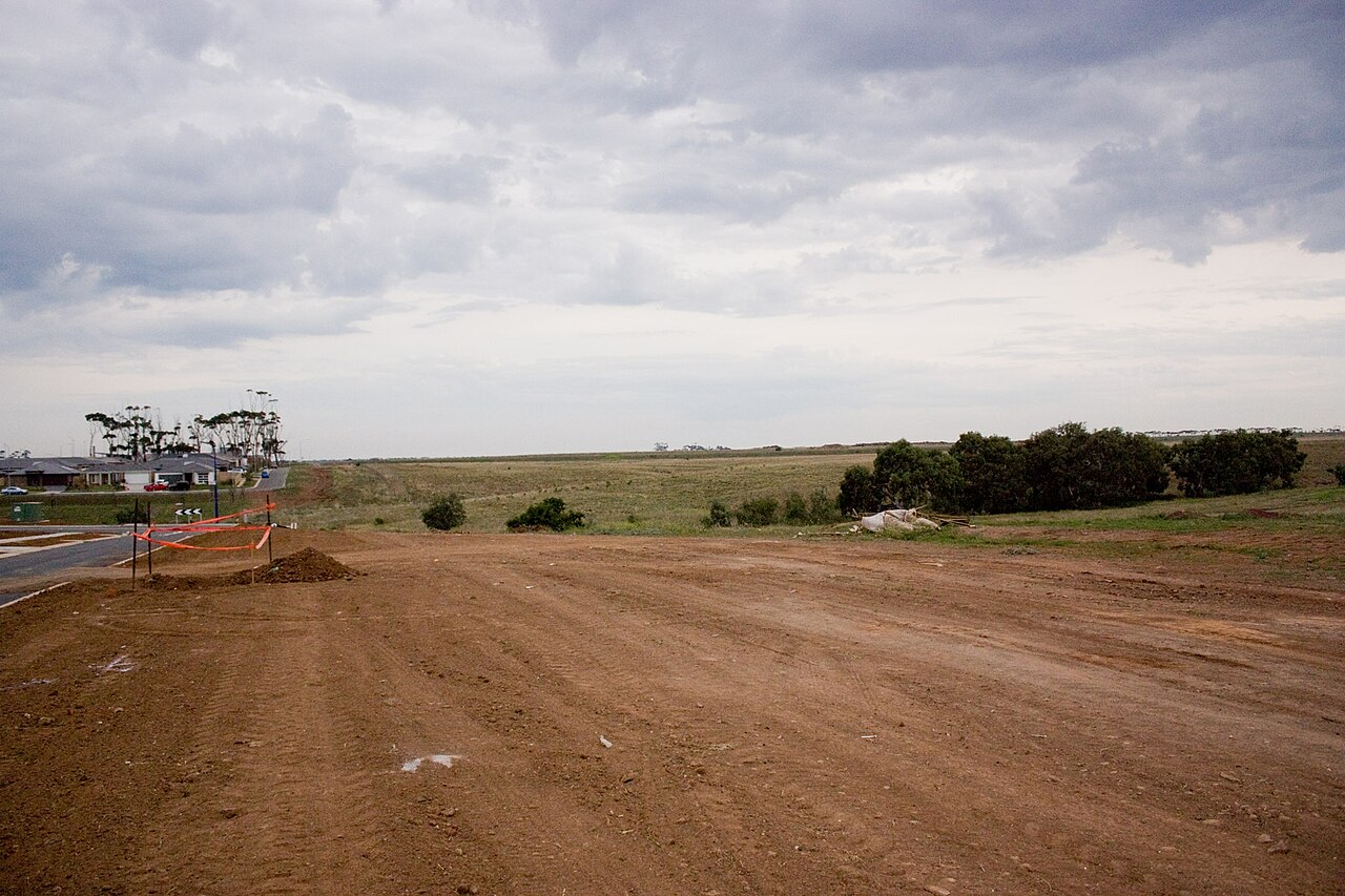 Unsealed public transport corridor across open land in Wyndham Vale