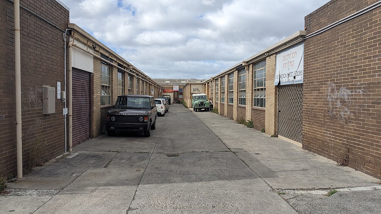 Laneway of brick warehouses at Satellite Studios on Victoria Street