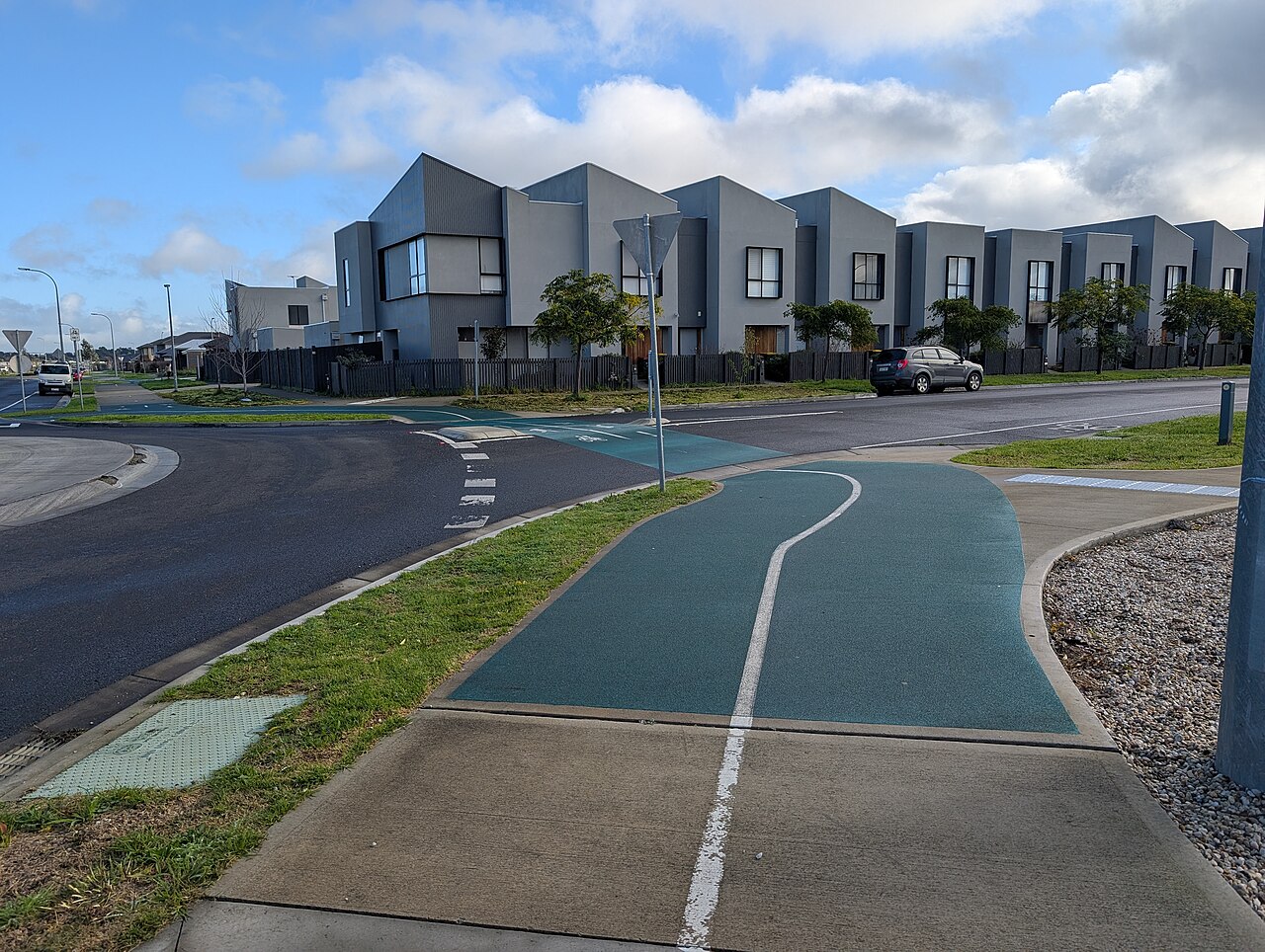 Shared path crossing beside new townhouses