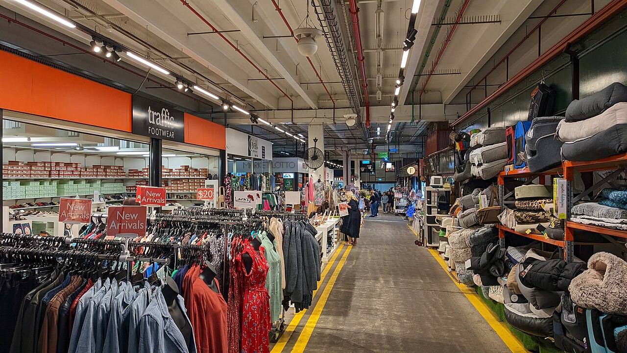Clothing stalls inside South Melbourne Market