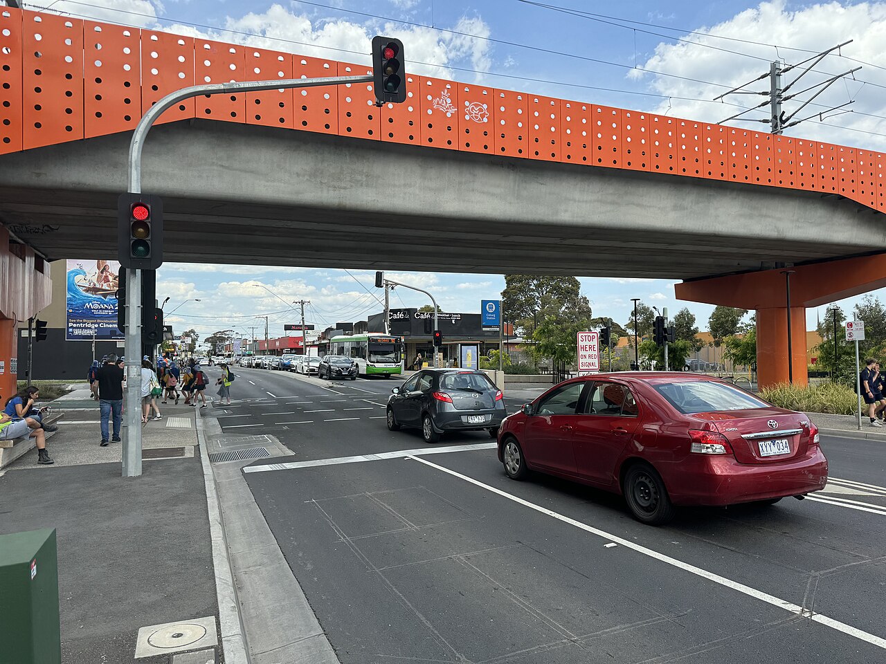 Site of the former Bell Street level crossing under the elevated rail