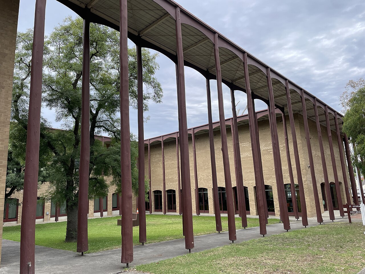 St Georges church building behind a timber colonnade, East Ivanhoe