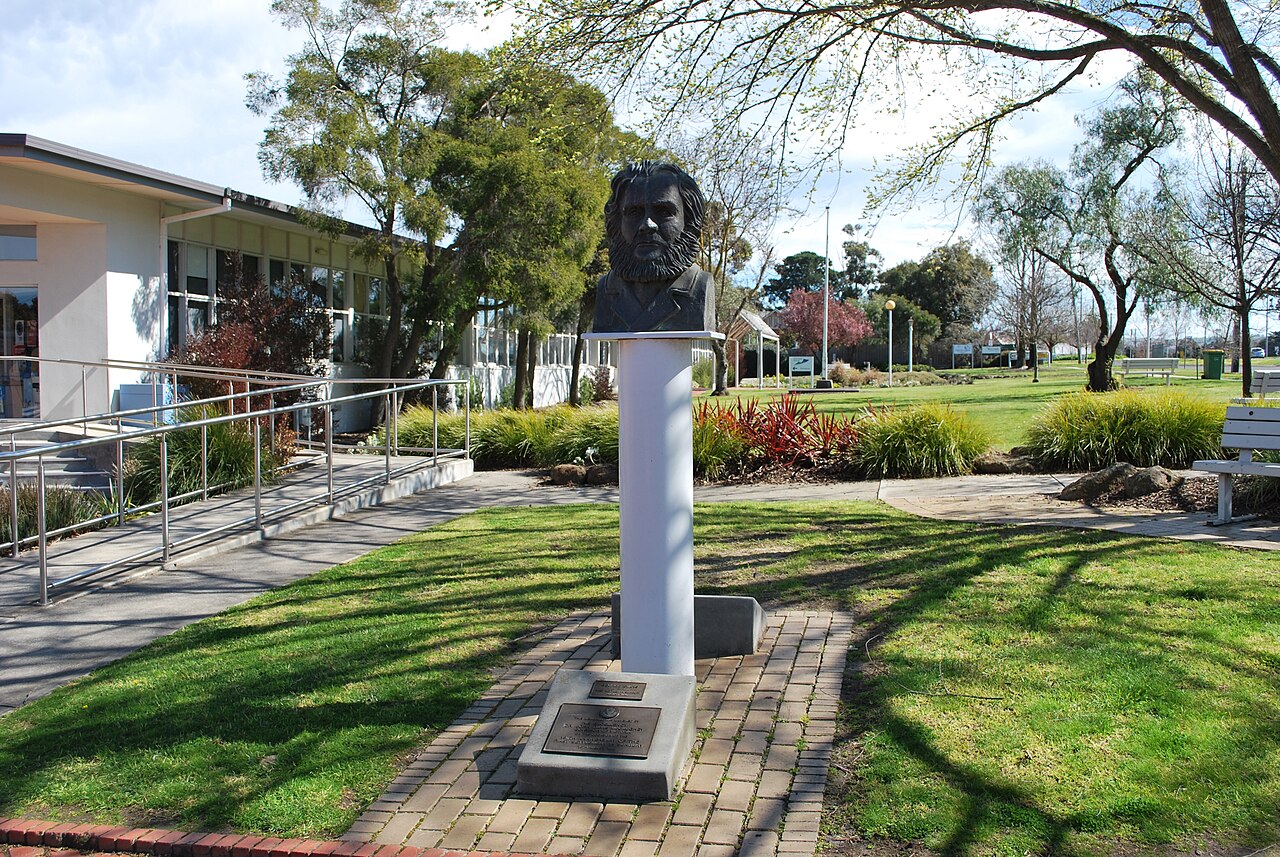 Sunbury George Evans Memorial bust in a garden