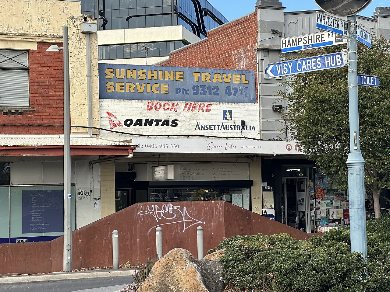 Sunshine Travel Service shopfront on a street corner