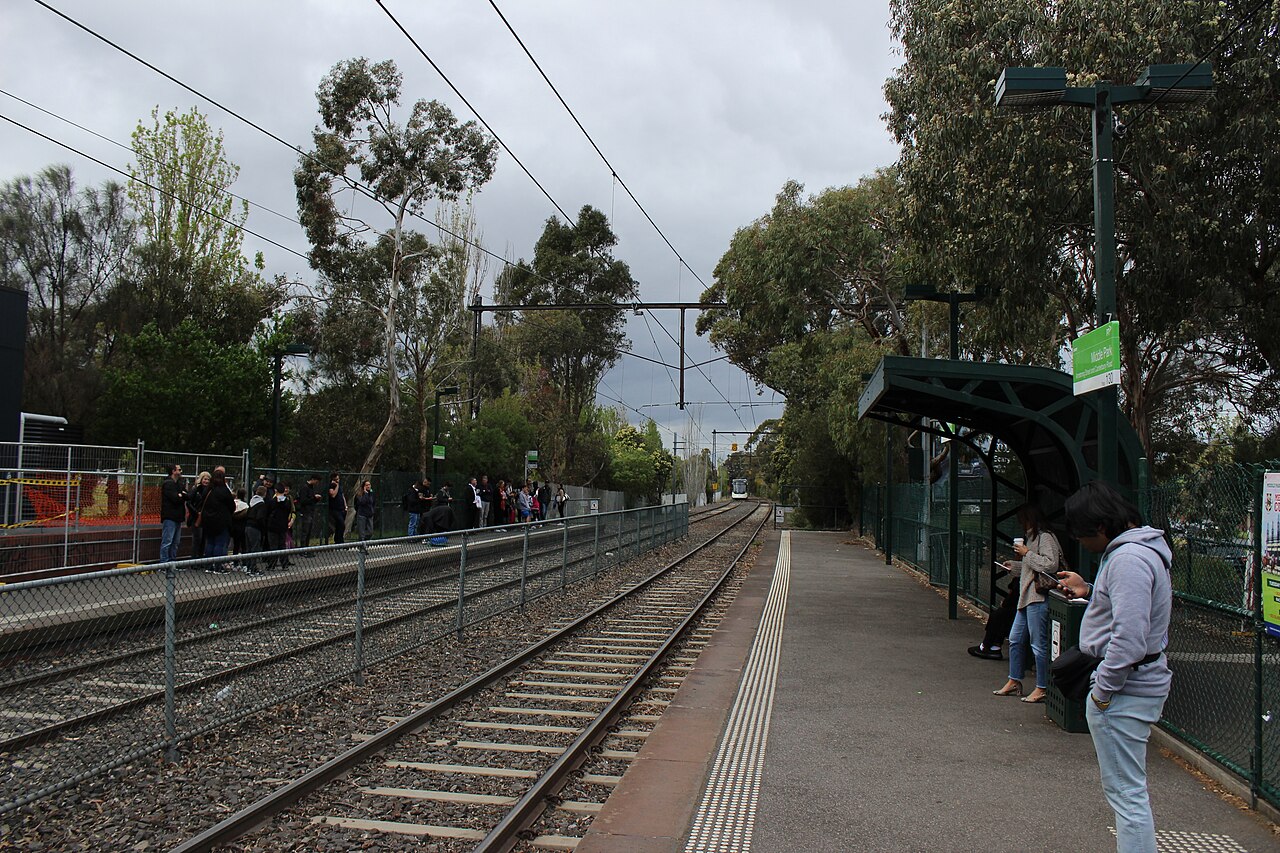Passengers waiting at Middle Park tram stop