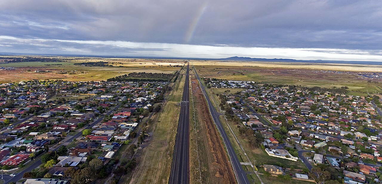 Aerial view of Werribee's western edge with a straight road to the horizon